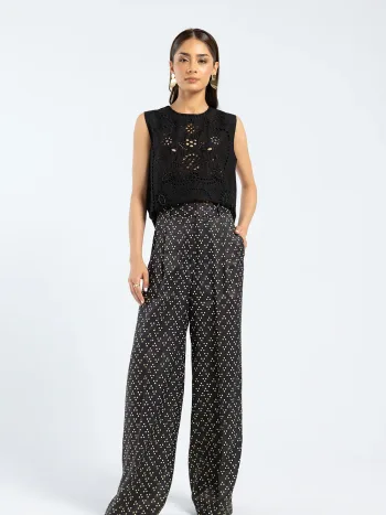 Model wearing a Black dotted pants cotton loose-fit black pants