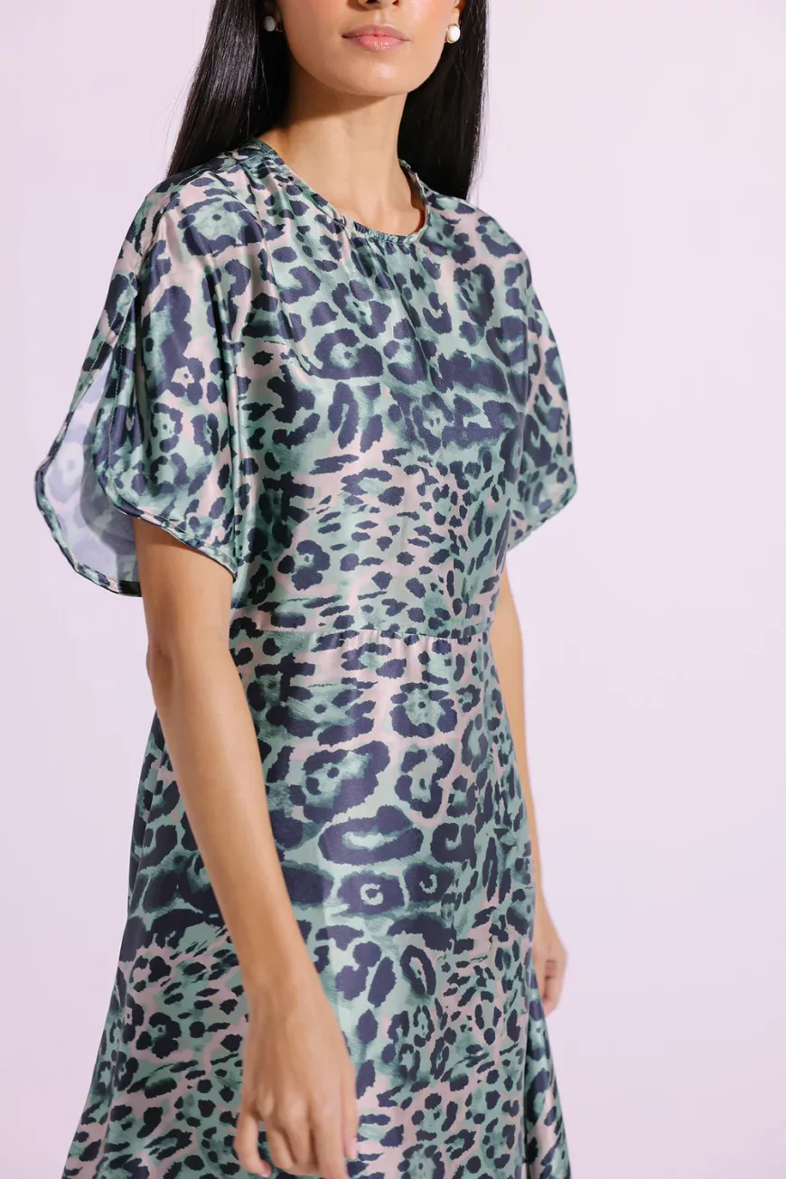"Women's grass green long dress with multicolor animal print, crafted in Poly Shamooz fabric – flowy one-piece party outfit"